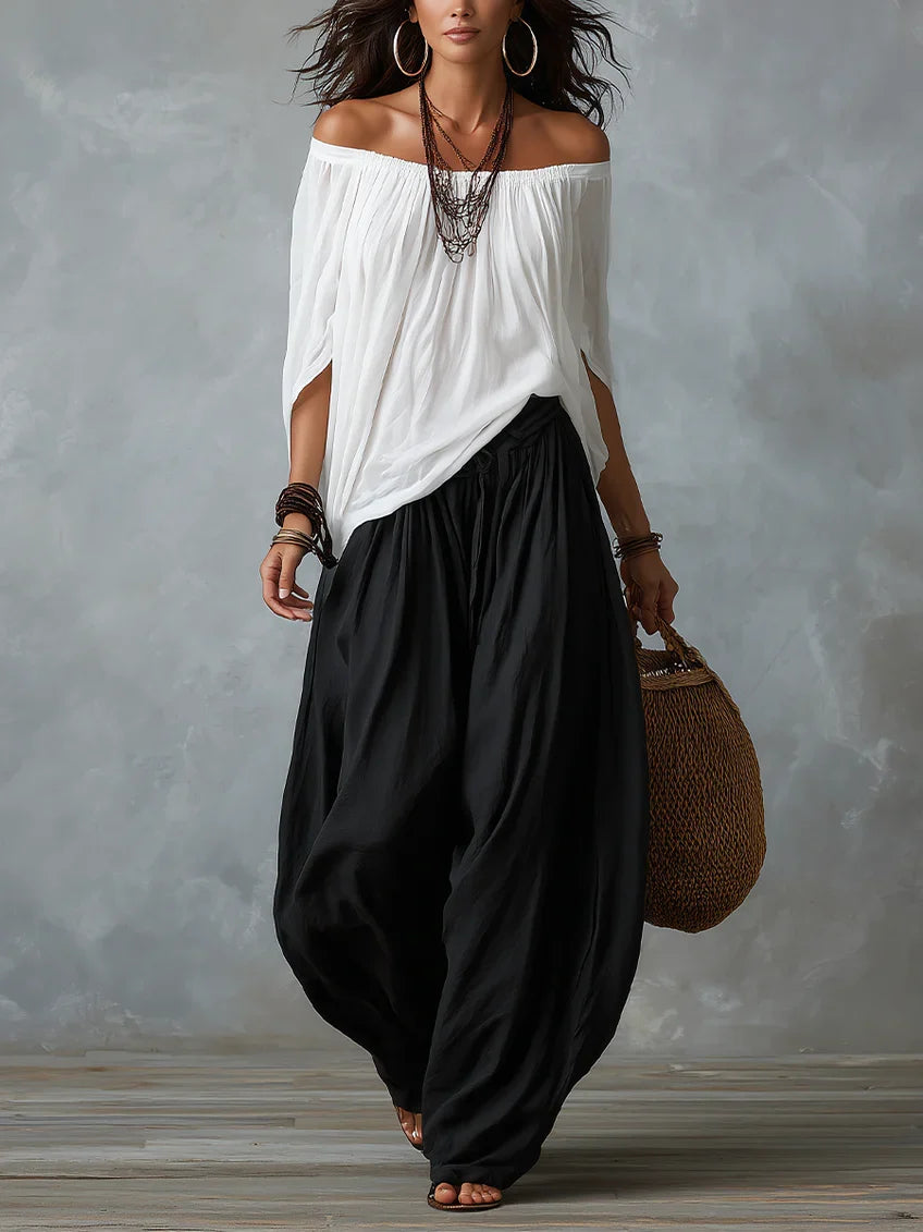 Mara • Conjunto blusa blanca hombros descubiertos y pantalón palazzo negro
